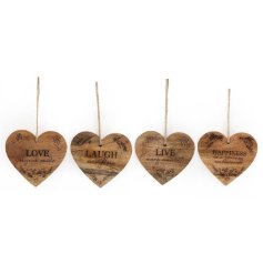 4 assorted wooden hearts with quotes hung from jute twine