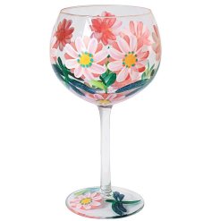 Hand painted gin glass with daisies and dragonflies.
