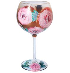 A beautiful glass with pretty in pink hand painted roses. A lovely gift item.