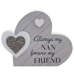 A wooden plaque with double heart design including delicate cut out detailing and sweet "Nan" text. 