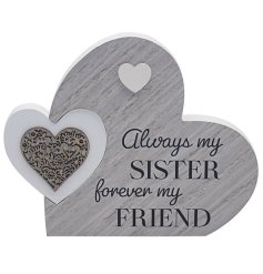 A plaque with "always my sister forever my friend" message and double heart design with cut out detailing. 