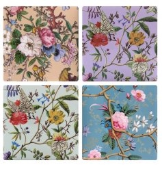 An assortment of 4 coasters each featuring a colourful William Kilburn floral pattern. 