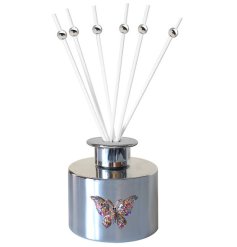 A beautiful silver diffuser with a jewelled butterfly design. A stunning gift item to fill the home with a fresh scent