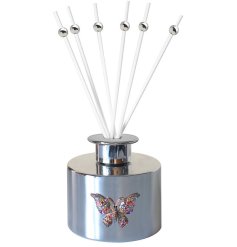 A beautifully scented diffuser in a stunning silver colour with a jewelled butterfly charm.