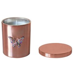 A beautiful glass candle holder in a luxurious rose gold finish. Decorated with an ornate jewelled butterfly.