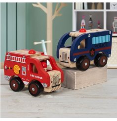 Retro wooden toy emergency vehicles. A fire engine and police van.