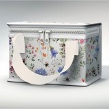 Made from recycled plastic bottles a insulated cool bag with a colourful garden bee design.
