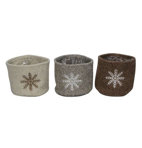 Showcase your trees and favourite seasonal plants with these chic fabric planters in stylish neutral colours. 