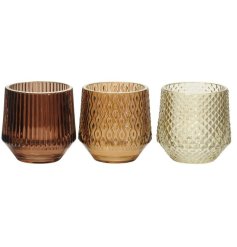 An assortment of 3 textured glass t-light holders in luxurious brown, gold and honey colours. 
