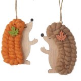 An assortment of 2 charming wooden hedgehog decorations with woolly details and jute hangers.