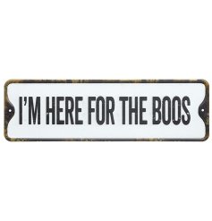 A rustic metal sign reading 'HERE FOR THE BOOS'. A unique seasonal decoration this halloween. 