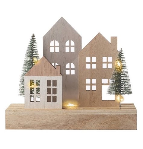 Natural wooden house scene with lights and two festive trees