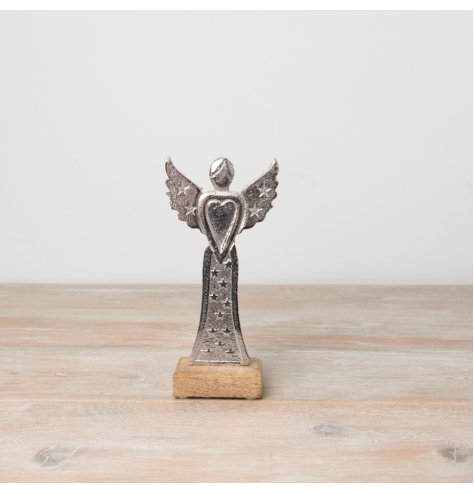 A beautiful aluminium angel decoration with 3d star details on a contrasting wooden base. 