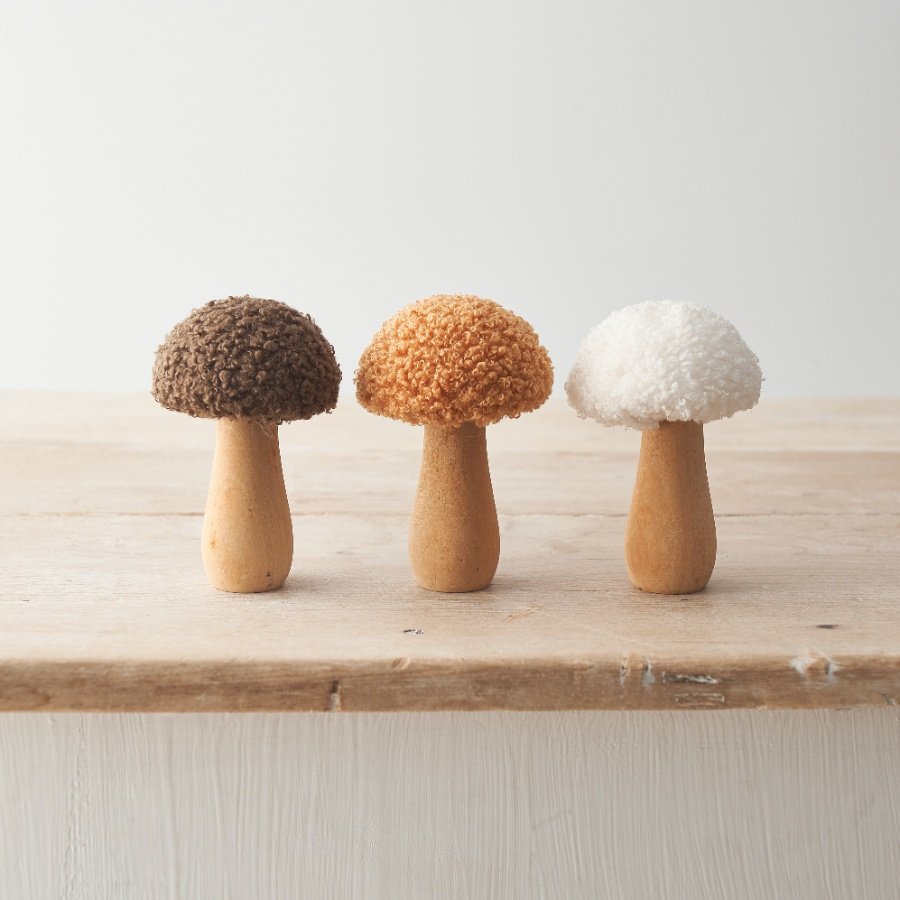 A beautifully textured seasonal accessory to add to your interior setting. In warming honey, cream and brown colours