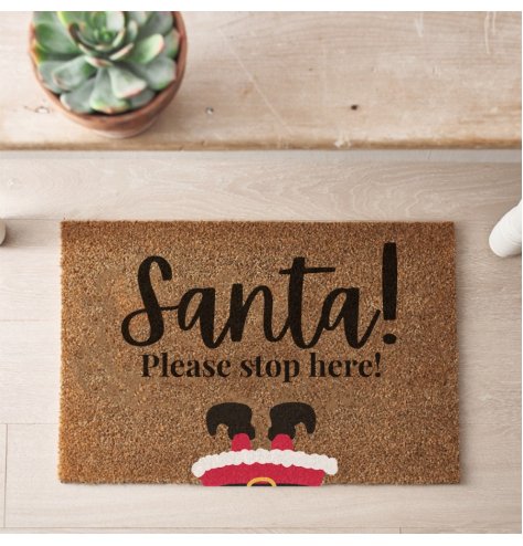 A festive coir doormat with "Santa please stop here!" message. 