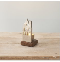 Chic silver house on a wooden stand