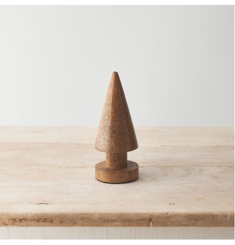 A chunky cone shaped Christmas tree crafted from natural mango wood. A unique interior accessory and seasonal decoration