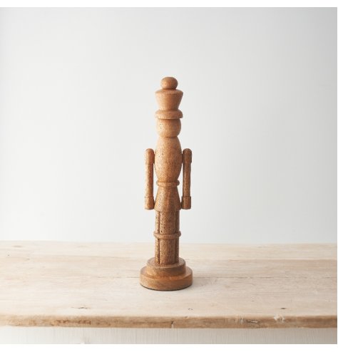 A minimalist and stylish wooden nutcracker decoration. 