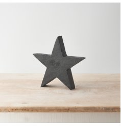 A contemporary black star with a rustic finish. An on trend accessory for the home. 