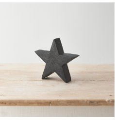 Bring warmth and texture to the home with this chunky wooden star with a black painted finish. 