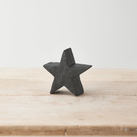 A chunky wooden star with a black finish. Beautifully textured adding character and warmth to interior spaces. 