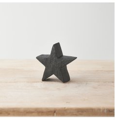 A chunky wooden star with a black finish. Beautifully textured adding character and warmth to interior spaces. 