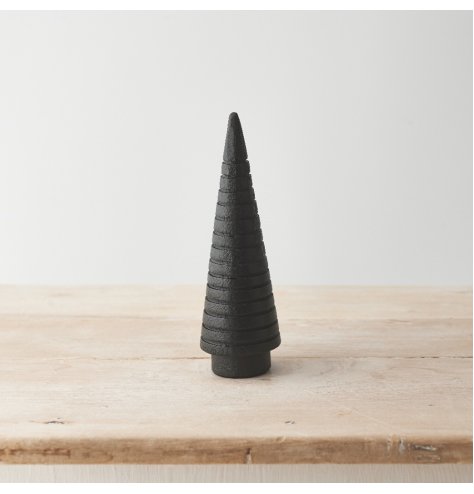 A contemporary wooden tree with a black painted finish. A sculptural interior accessory for the home 