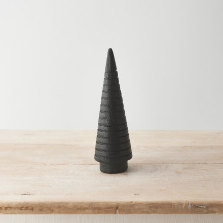 A chic and contemporary Christmas tree made from mango wood with a black painted finish. 