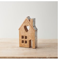 A chunky house ornament made from natural mango wood. With a smooth finish and rustic wood grain