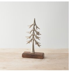 A beautiful silver tree ornament with a hammered finish and chunky mango wood base. 