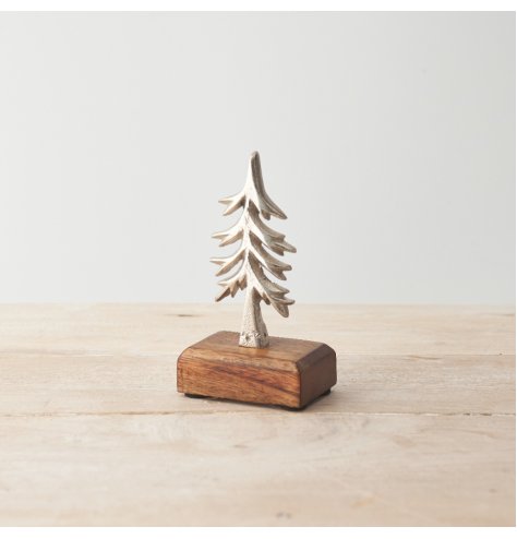 Dress the home in style this season with this tree ornament. Beautifully crafted with a rustic finish and chunky base.