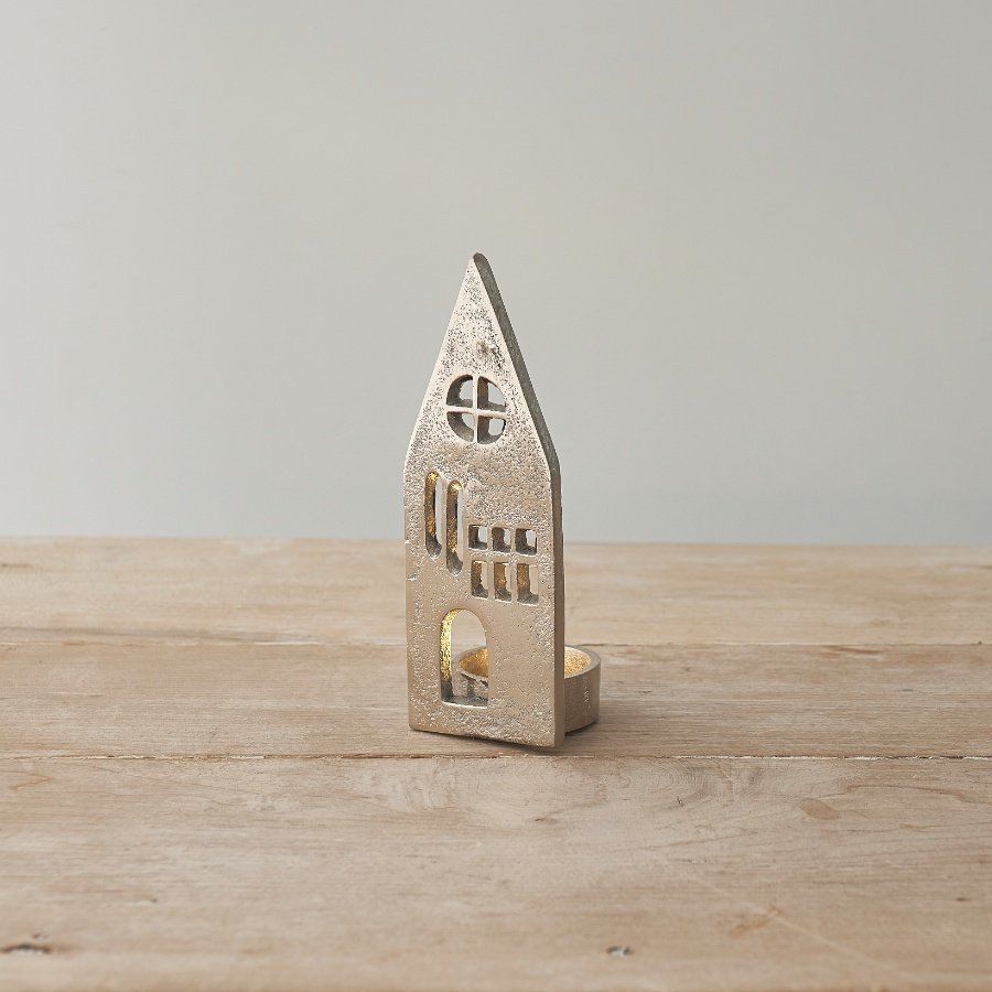 A rough luxe t-light candle holder with a contemporary house front. Beautifully detailed with inset windows and doors. 