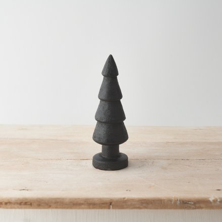 A sculpted cone tree made from mango wood. With a black, distressed finish. 