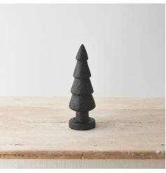 A contemporary black painted Christmas tree with base. Beautifully carved from natural mango wood with a rustic finish. 