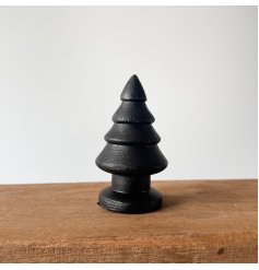 A chunky wooden Christmas tree, carved from natural mango wood. Complete with a rustic, black painted finish.