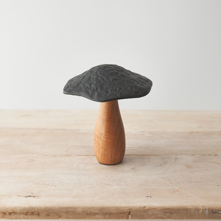 Add texture and character to the home with this top trending mushroom ornament. 