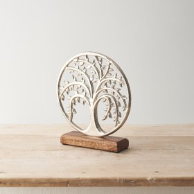 A chic tree of life ornament. A stunning, whimsical tree cascading within a circle. 