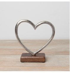 Silver brushed effect heart on a chunky wooden base