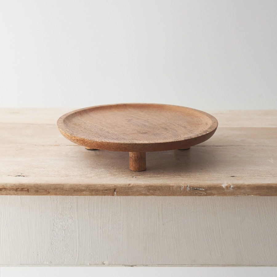 An attractive display plate with feet. Beautifully crafted from natural mango wood. 