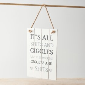 A slatted sign with rope hanger, heart detail and humorous "it's all shits & giggles until someone giggles & shits" text