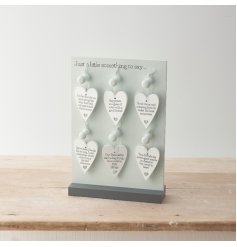 An assortment of 6 heart signs all with friendship quotes displayed on them