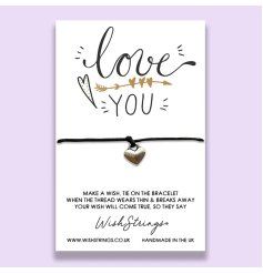 Show your love with this charming and unique wish bracelet with heart charm and slogan card. 