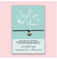 Just for you. A pretty heart shaped charm bracelet with a stylish slogan card with room for your own message. 