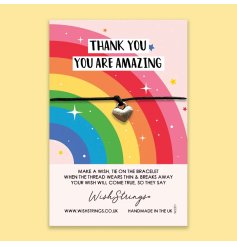 Say thank you with this unique and thoughtful gift. A pretty heart charm sits upon a colourful rainbow card.
