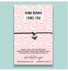 Some bunny loves you. A charming and thoughtful seasonal gift with a cute heart charm and bunny themed backing card.