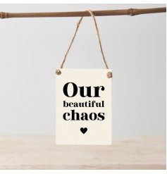 A chic mini metal sign with a beautiful graphic slogan and rustic jute string hanger.