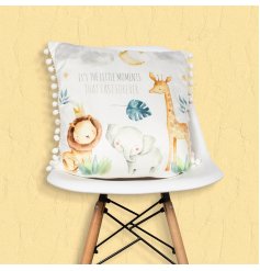 A cute cushion with illustrated safari animal design with star and moon detail. 