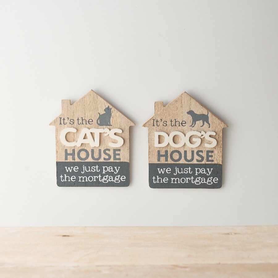 A quirky assortment of natural wooden house shaped plaques each decorated with a fun grey and white text decal.