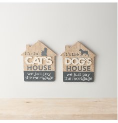 A quirky assortment of natural wooden house shaped plaques each decorated with a fun grey and white text decal.