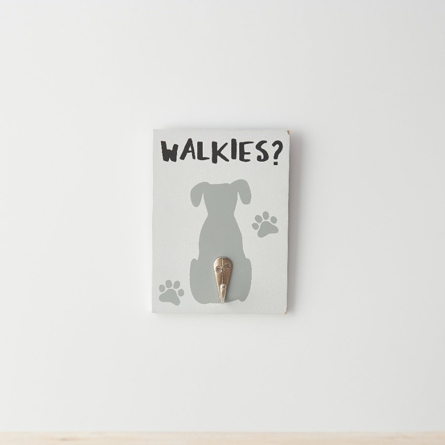 A cute sign featuring a dog design with "walkies" text  and hook detail, perfect for housing your dog's lead. 